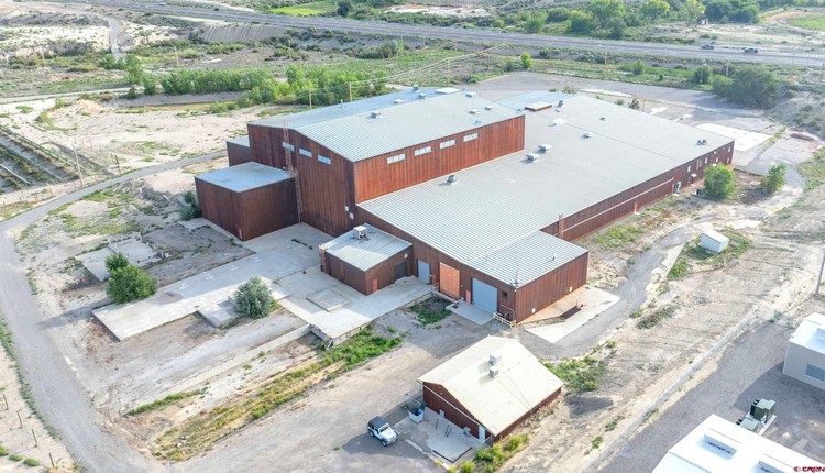 Aerial view of a Colorado Summit industrial facility and yard